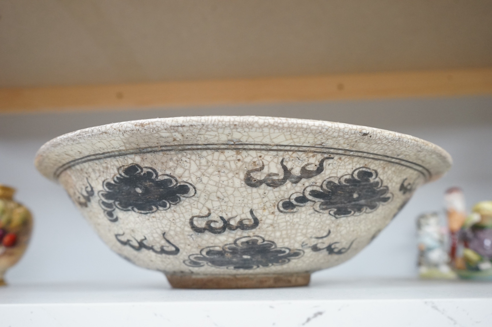 A Sukhothai-style crackleware dragon' dish, 30cm in diameter. Condition - fair